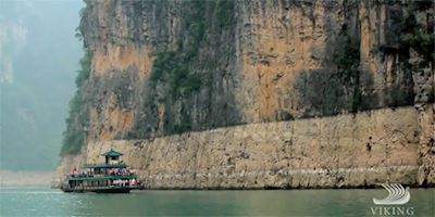 Ship sailes by Three Gorges Dam in China
